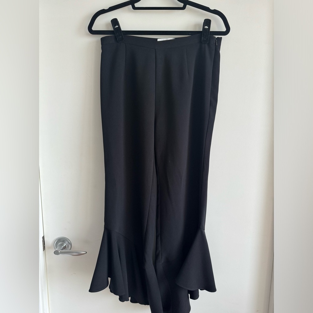 Likely black side ruffle pant
